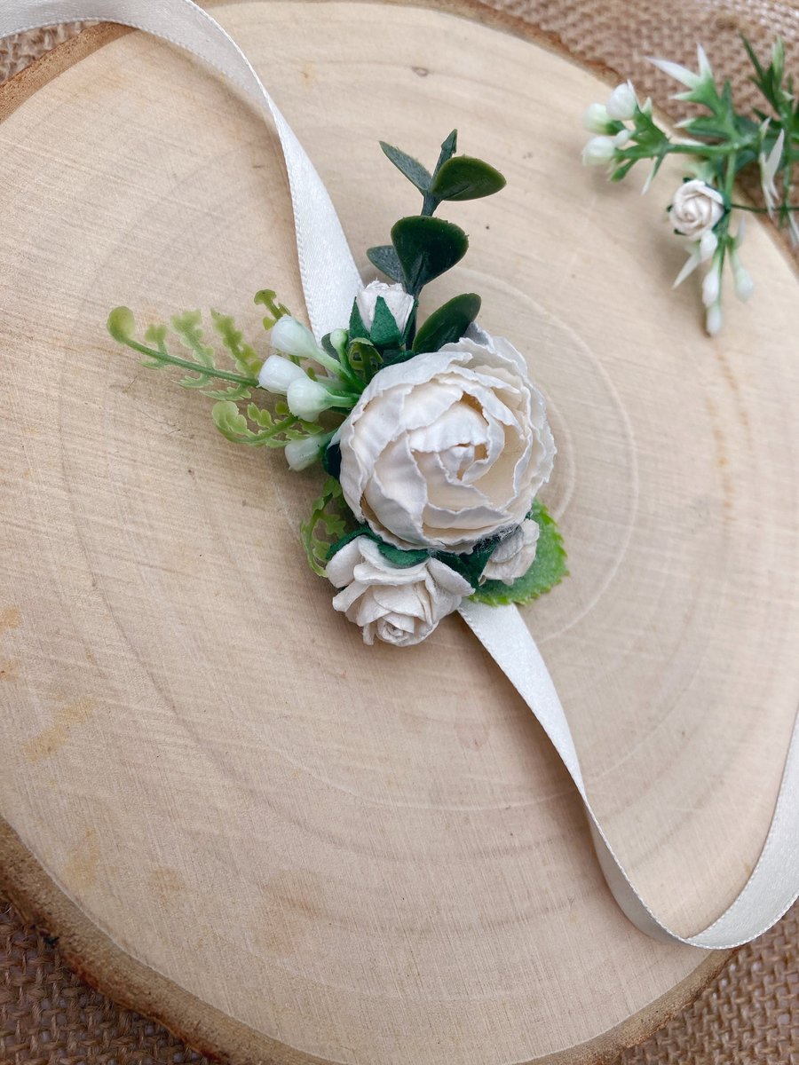 Small white wrist corsage 