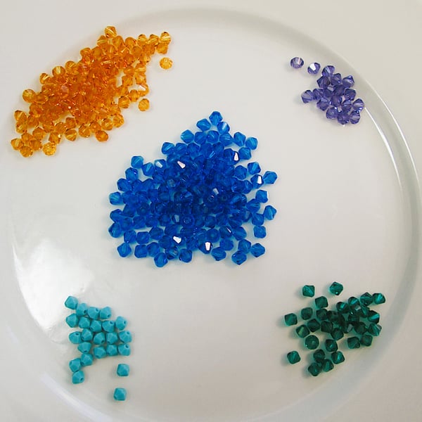 Destash 4mm czech glass bicone beads