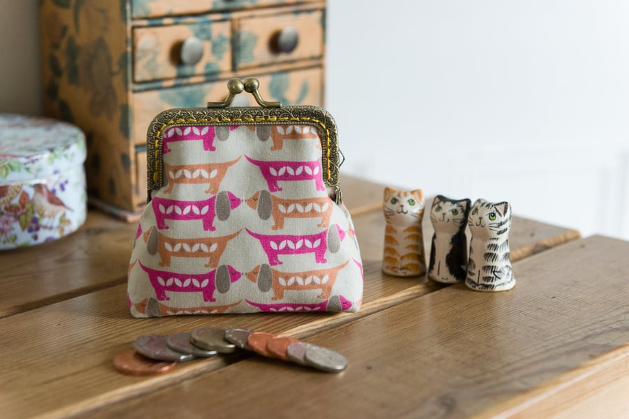 Coin purse made with fun Dachshund print in gold and pink