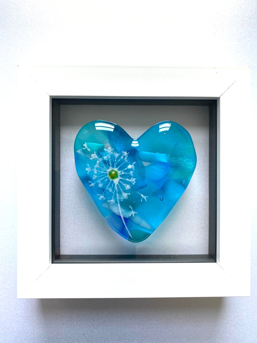 Glass heart in a frame