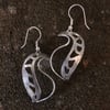 Sterling silver shell earrings with pierced design