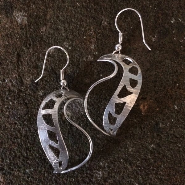 Sterling silver shell earrings with pierced design