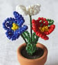 Red, White and Blue Miniature Flowers in a Pot - Image 3