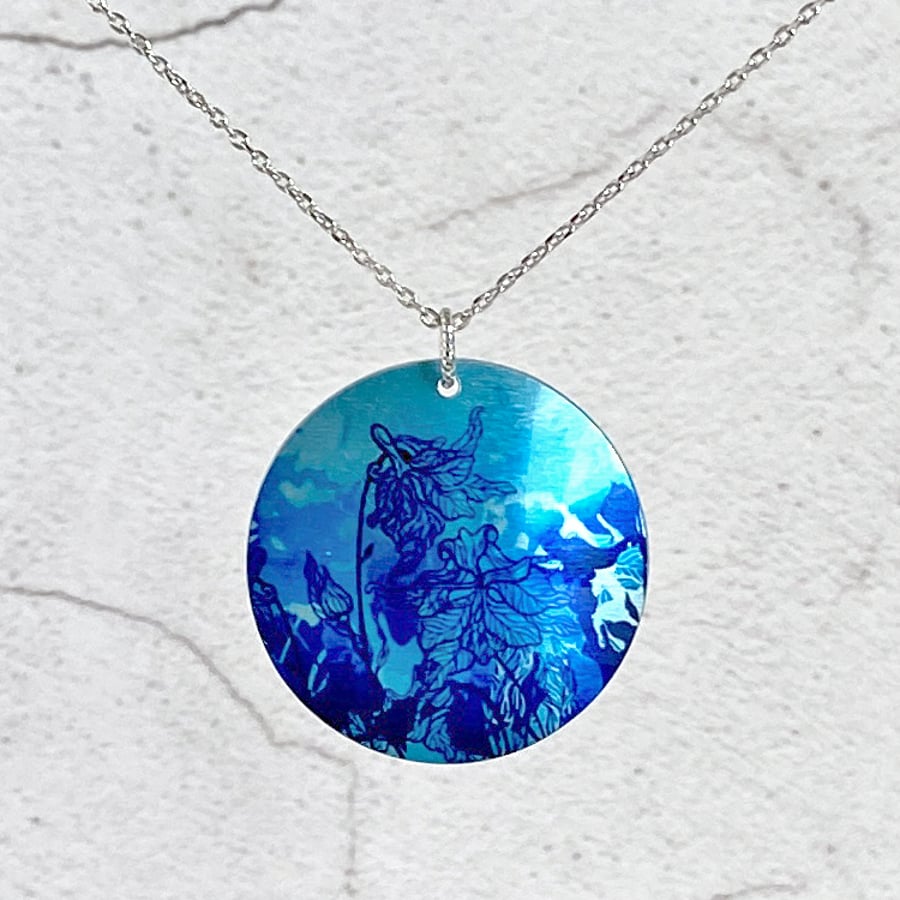 Floral blue necklace, 32mm disc pendant on chain, handmade jewellery. (84)