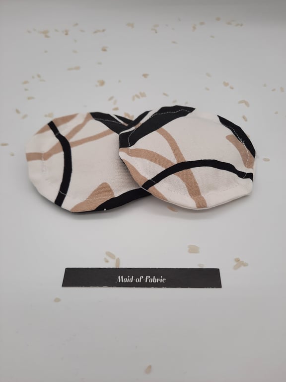 Heat pads, Hand warmers rice filled in cream, black and tan fabric.  