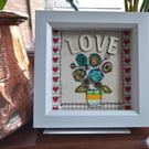 Love flower vase design using applique and free motion embroidery techniques