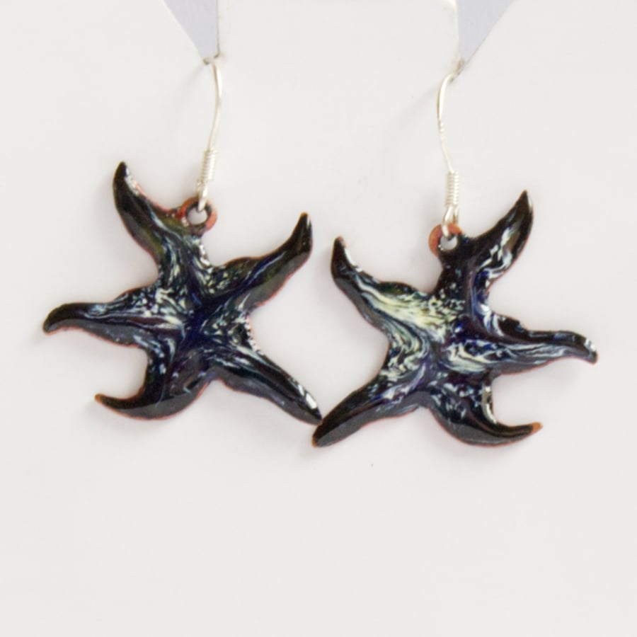 starfish: white and gold scrolled on dark blue - earrings