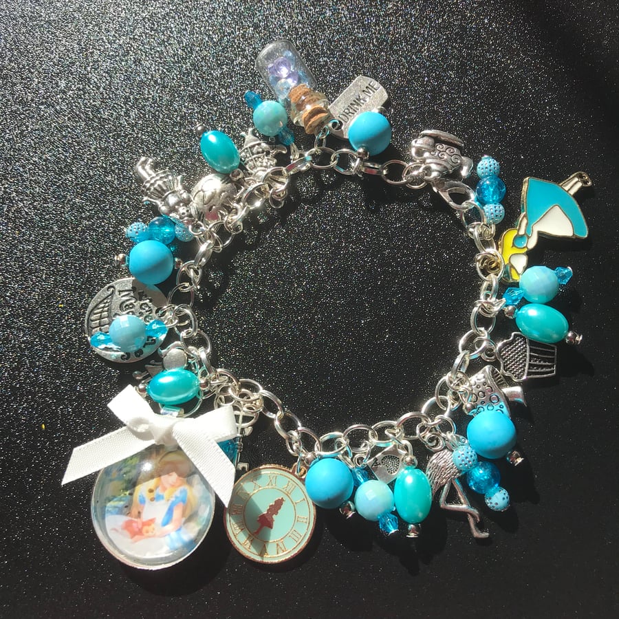 Alice in wonderland blue dangle charm bracelet