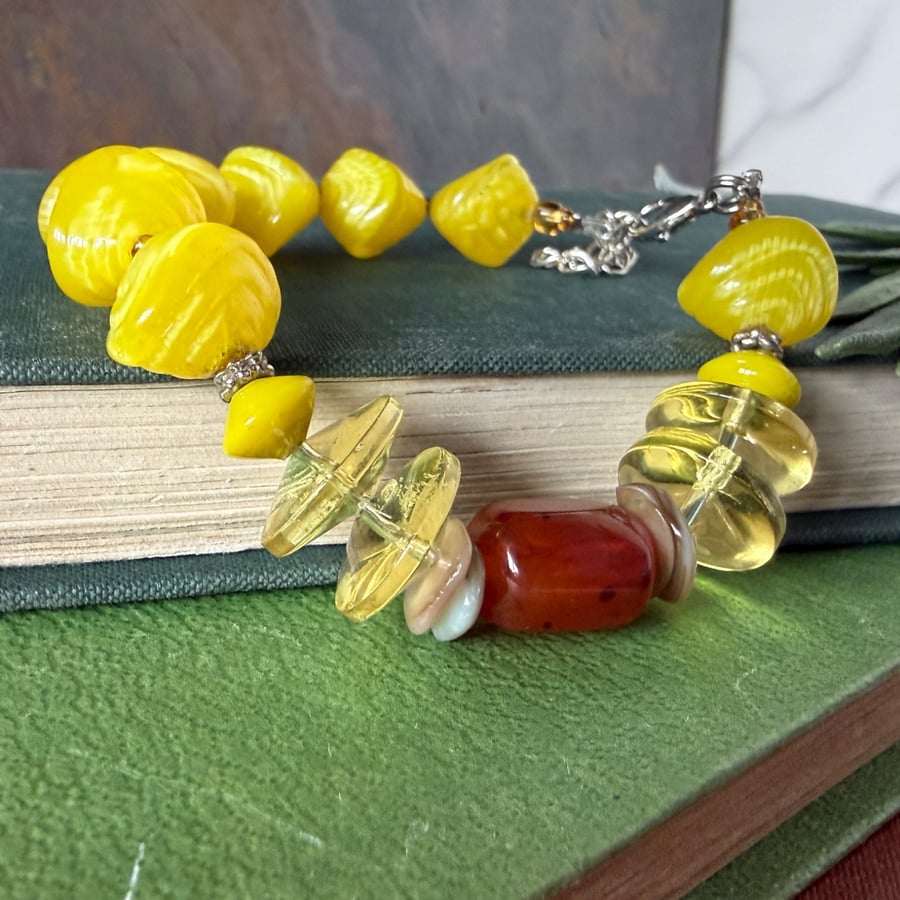Bright yellow glass bead bracelet with extender chain