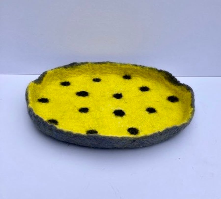 Felted yellow dotty dish.