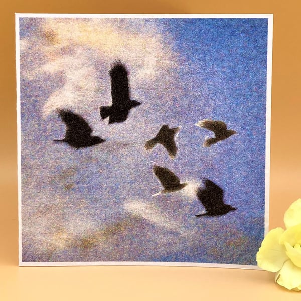 Blank Greetings Card, Crows flying in a dusky blue evening sky, no message. 