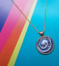 Gorgeous Blue Spiral in an Antique Gold Pendant