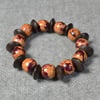 Round Patterned Wooden Bead and Dark Brown Wood Rondelle Elastic Bracelet