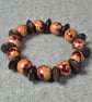 Round Patterned Wooden Bead and Dark Brown Wood Rondelle Elastic Bracelet
