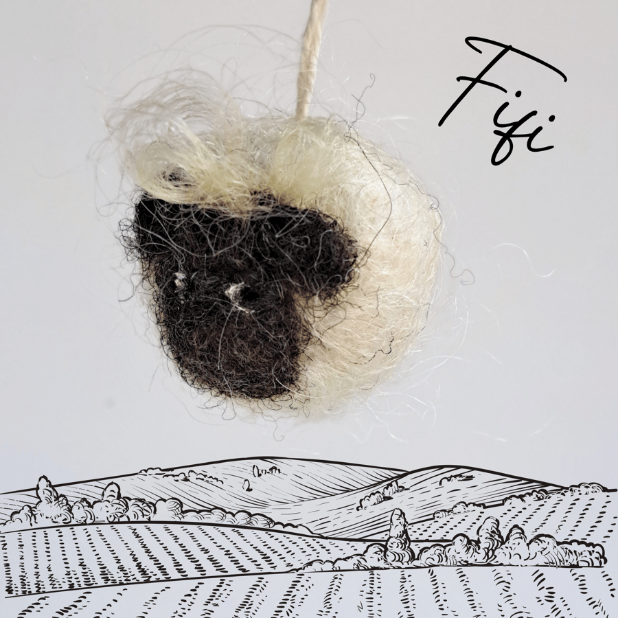 Fifi the Sheep keyring and a pocket-sized stress buddy xs