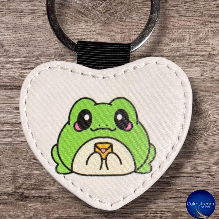 Limited Edition Frog Keyrings, with gold backing. Young Artist Designed