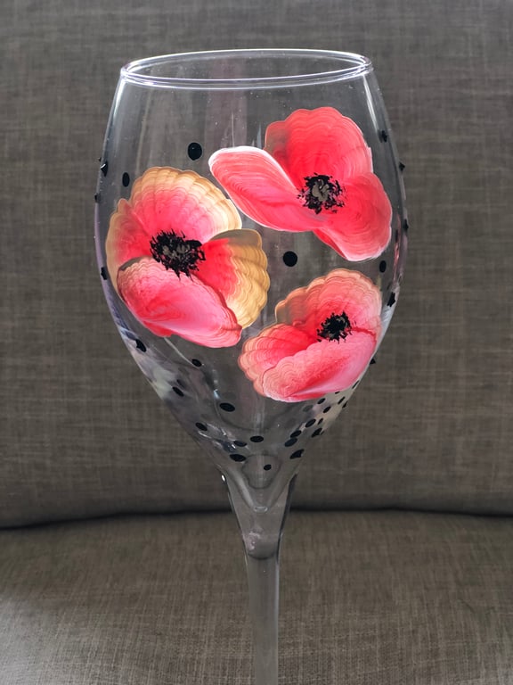 Hand painted wine glass with poppies and gift bag