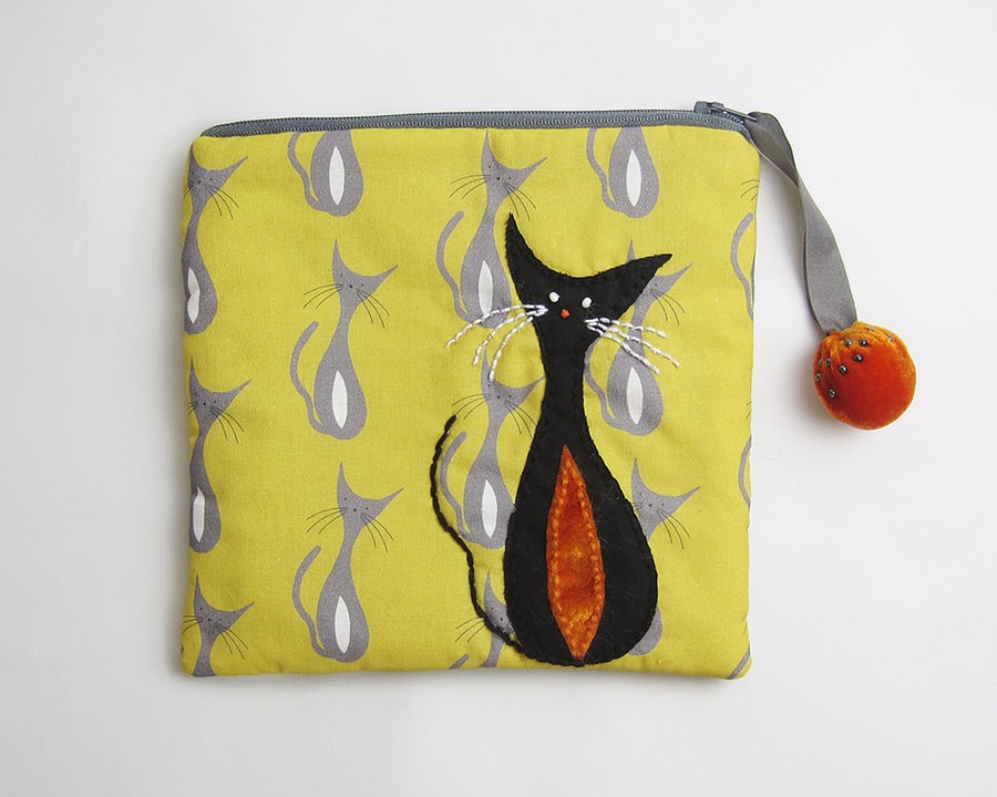 Mustard and grey make up bag with mid century cat print and appliqué