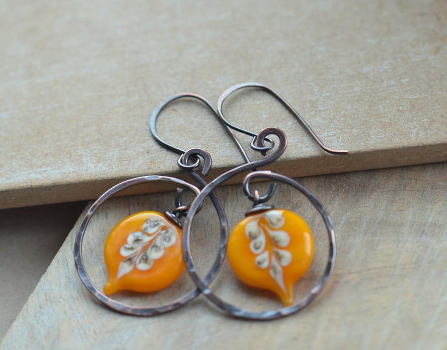 Copper Swirl Earrings with Orange Lampwork Leaf Beads