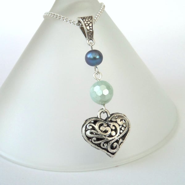 Pearl and pastel green shell pearl necklace with heart charm