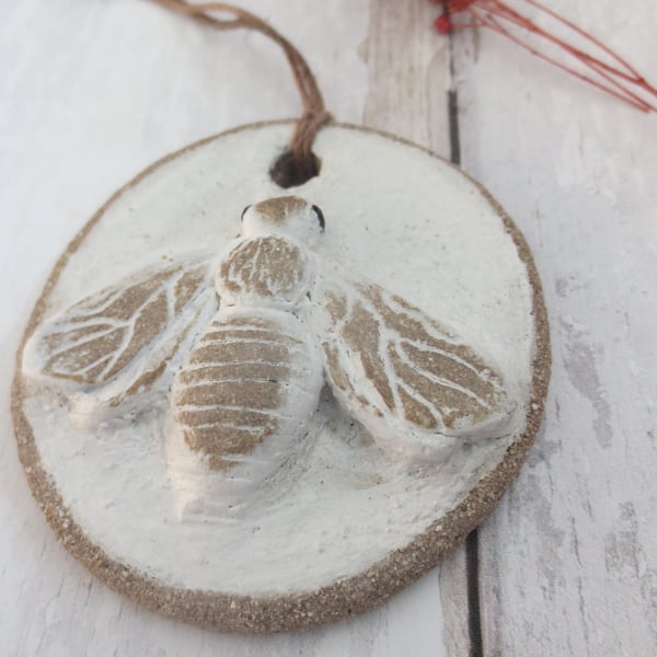 Hand-built stoneware small bee wall plaque ornament in white