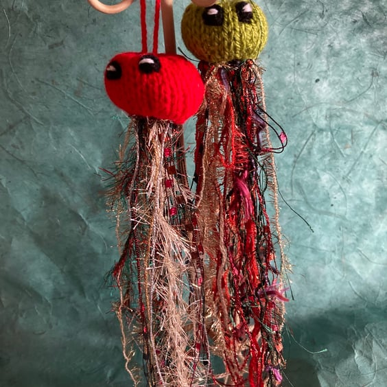 2 hand knitted sparkly jellyfish