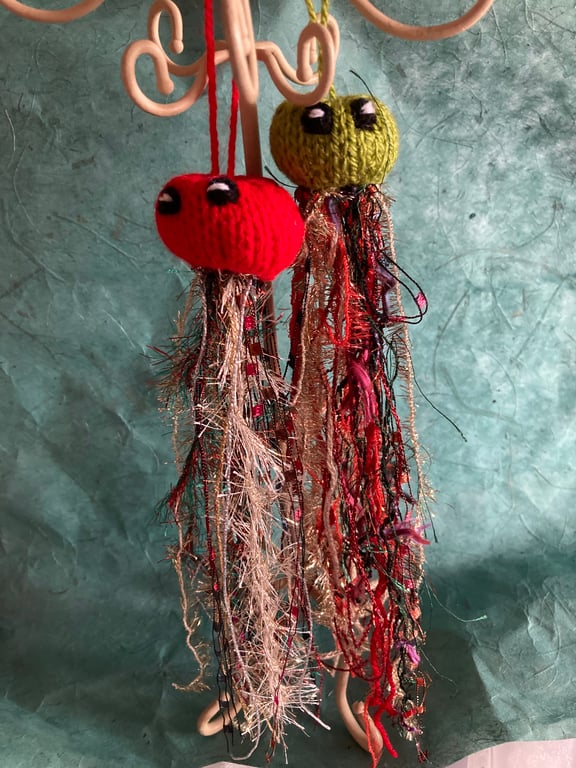 2 hand knitted sparkly jellyfish
