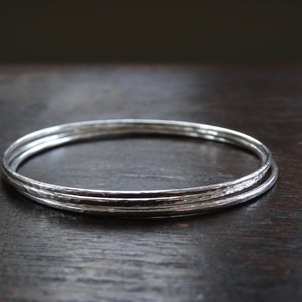 Set of three graduated recycled sterling silver stacking bangles