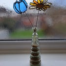 Stained glass flowers in vase