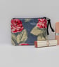Coin purse in floral oilcloth