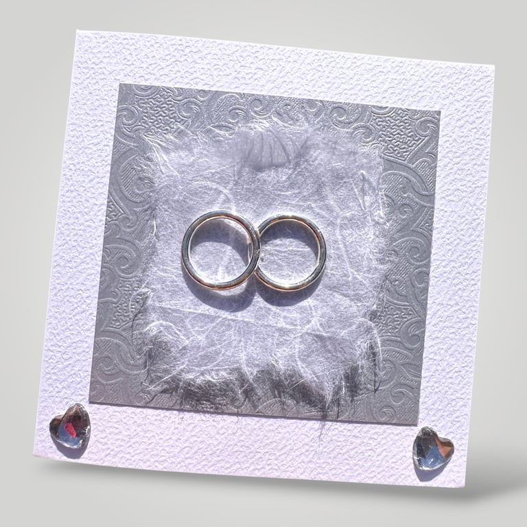 Silver Wedding Bands Handmade Wedding Card, embossed and handmade papers. 