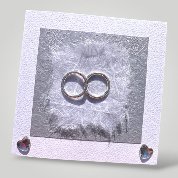 Silver Wedding Bands Handmade Wedding Card, embossed and handmade papers. 