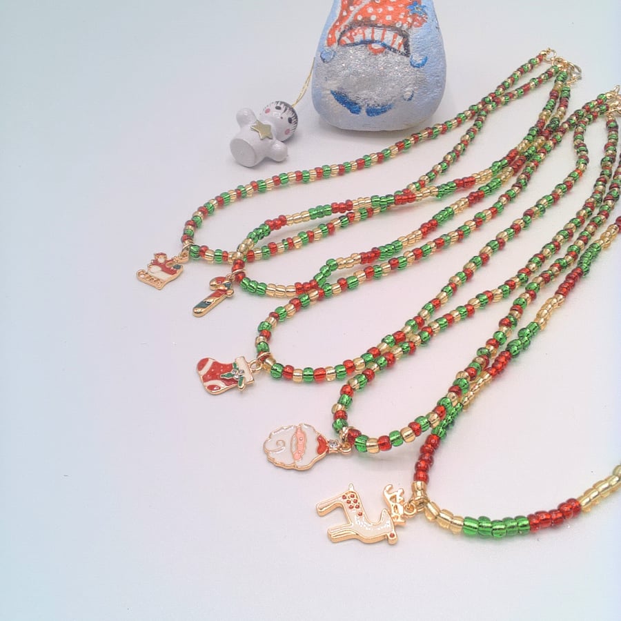 Red Gold and Green Bead Necklace with Gold Plated Enamelled Christmas Charms