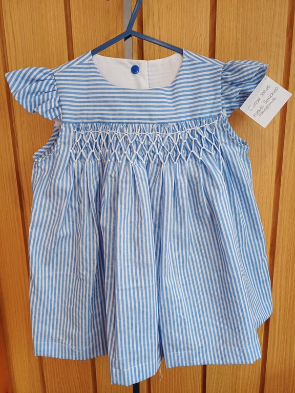 Smocked blue striped girls dress