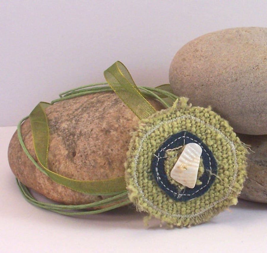 Round fabric pendant necklace with shell detail