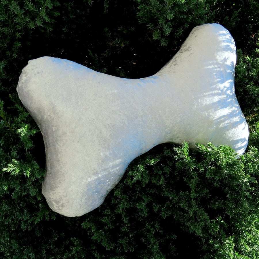The silver bone.  A bone shaped cushion.  Dog pillow.  42cm in length.