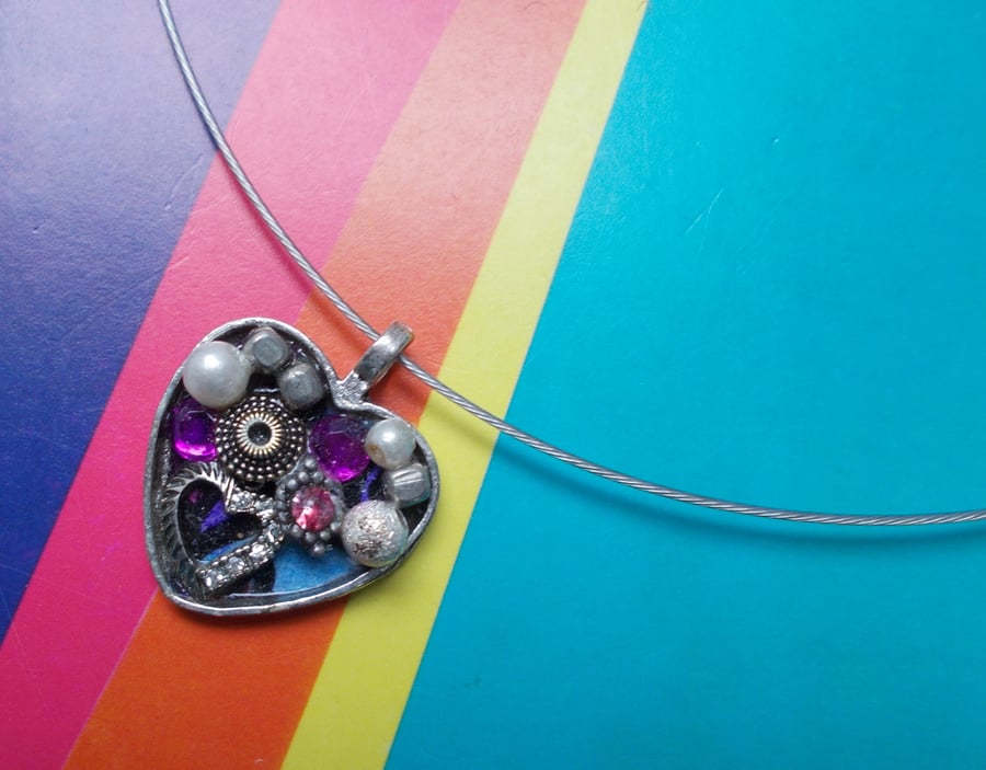 A Heart within a Heart Pendant on a Choker