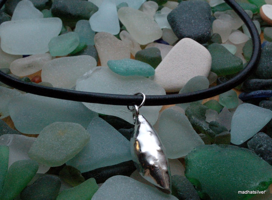 Silver 'pod' necklace on leather cord