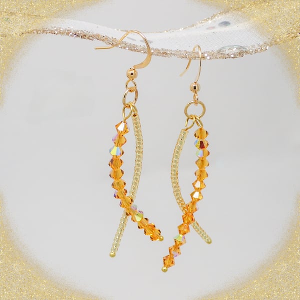 Gold Beaded Dangle Earrings with Sparkly Crystals.