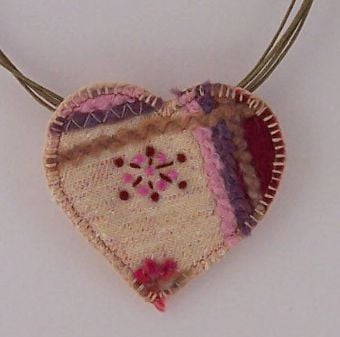 Embroidered love heart textile necklace 
