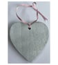 A wooden heart shaped pendant with a mauve theme and glass beads. - Image 2