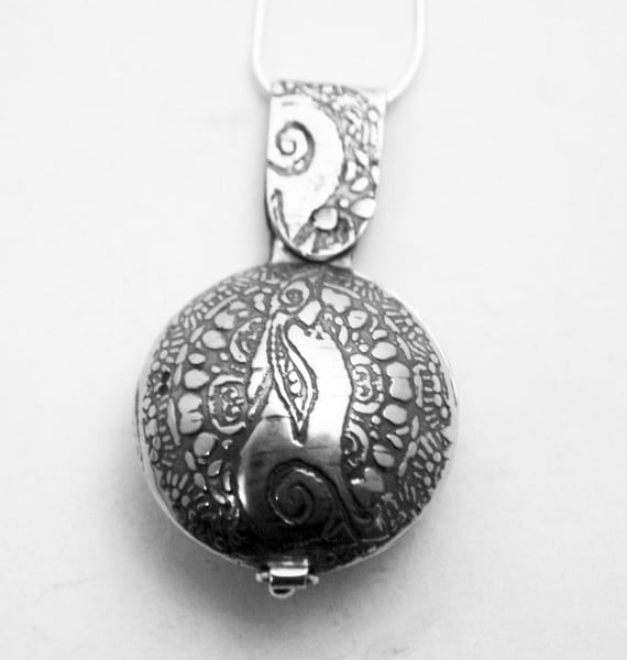 Sterling silver Moongazing Hare locket, swivel design