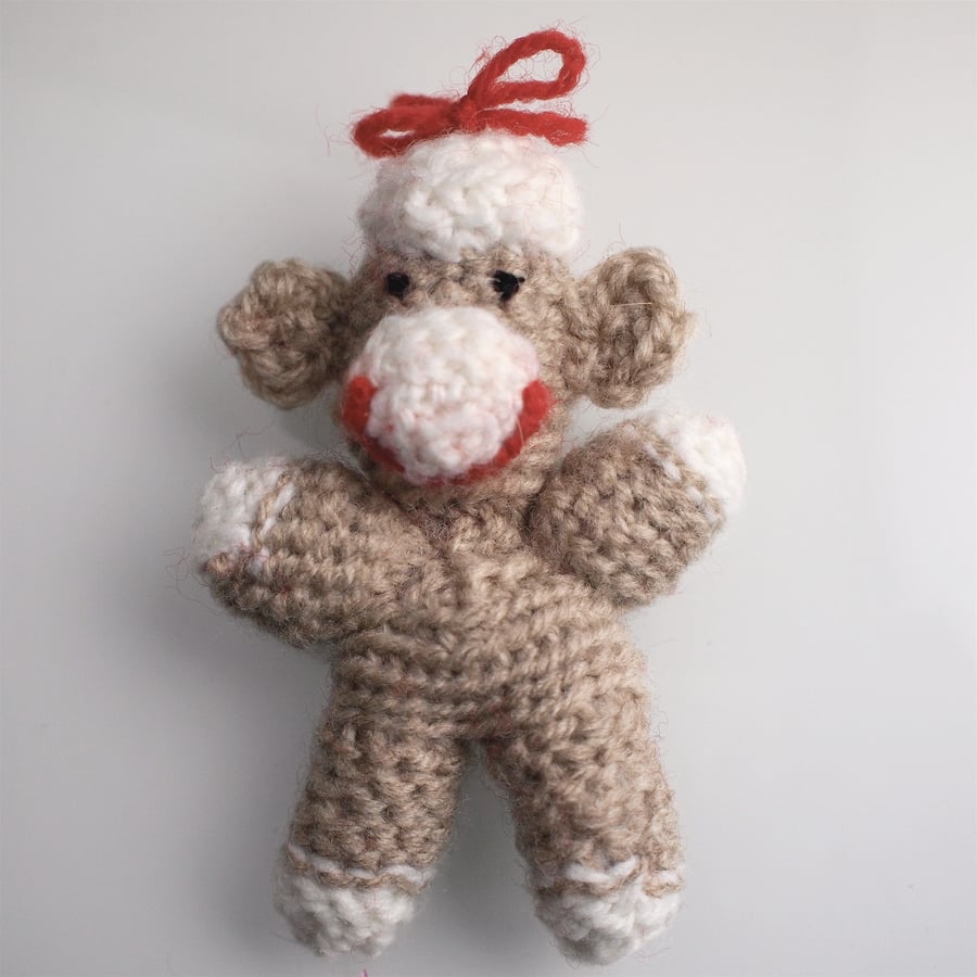 Cheeky little amigurumi monkey