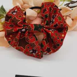 Hair bobble bow in red Christmas star fabric. Free uk delivery.  