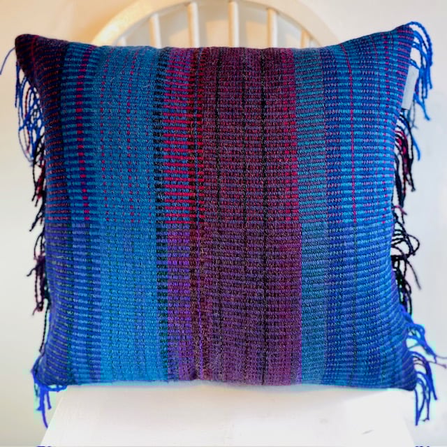 Fringed hand  woven cushion 
