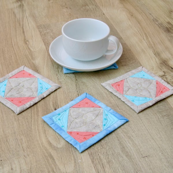 Set of Four Blue, Pink and Grey patchwork coasters with Stars pattern