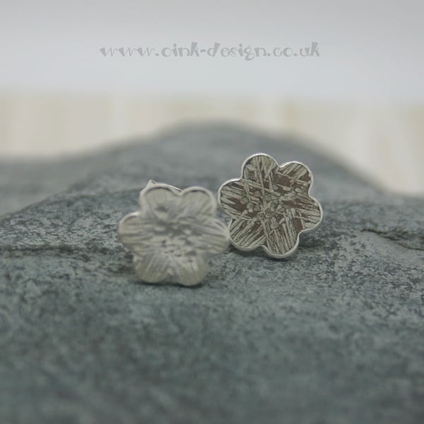 Sterling silver flower stud earrings with a textured finish