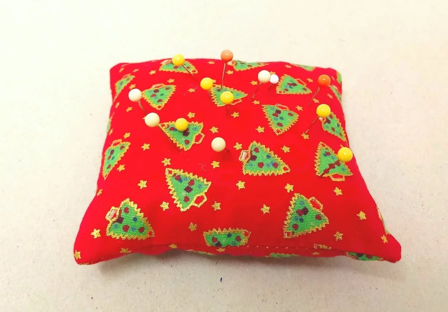 Pin cushion in red with Christmas trees and gold stars, sewing accessory