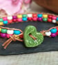 Multicoloured howlite bead and leather bracelet with green ceramic heart button - Image 7