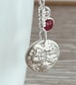 Sterling silver  botanical pendant with ruby charm on silver chain - Image 1